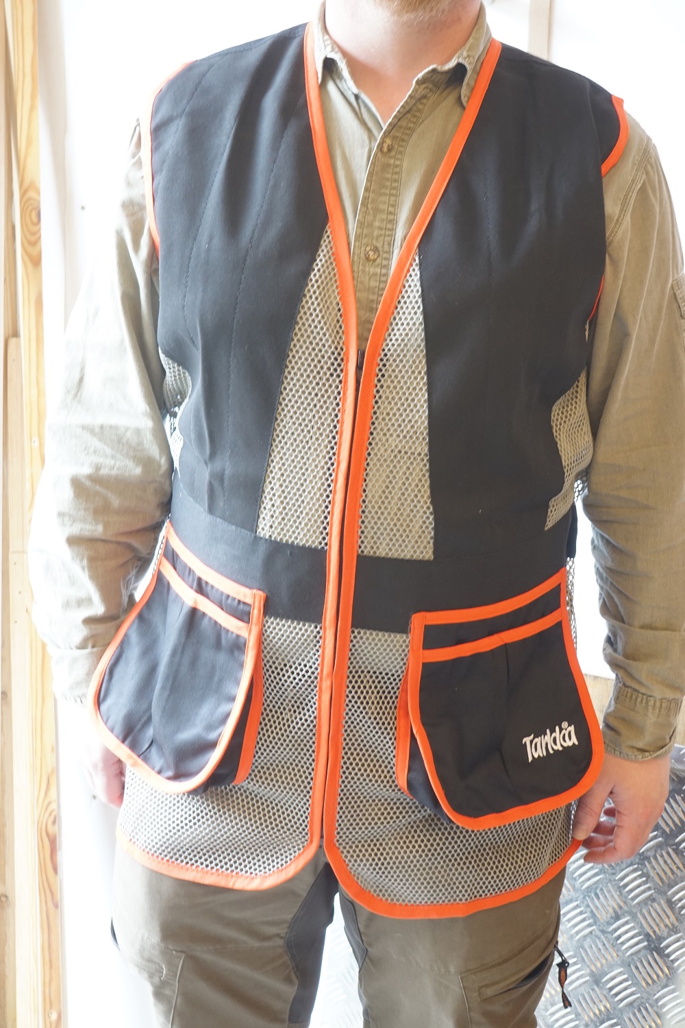 Tarkka Pro Haulikkoliivi musta/harmaa/Oranssi, koko XL