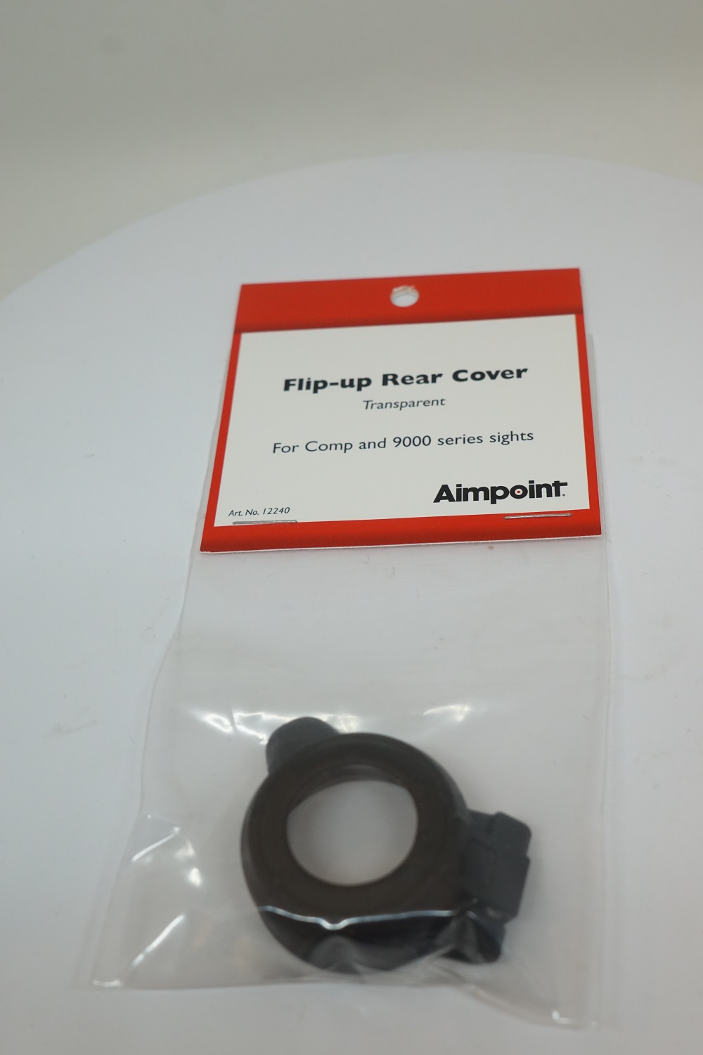 Flip-up linssinsuojus takimmainen