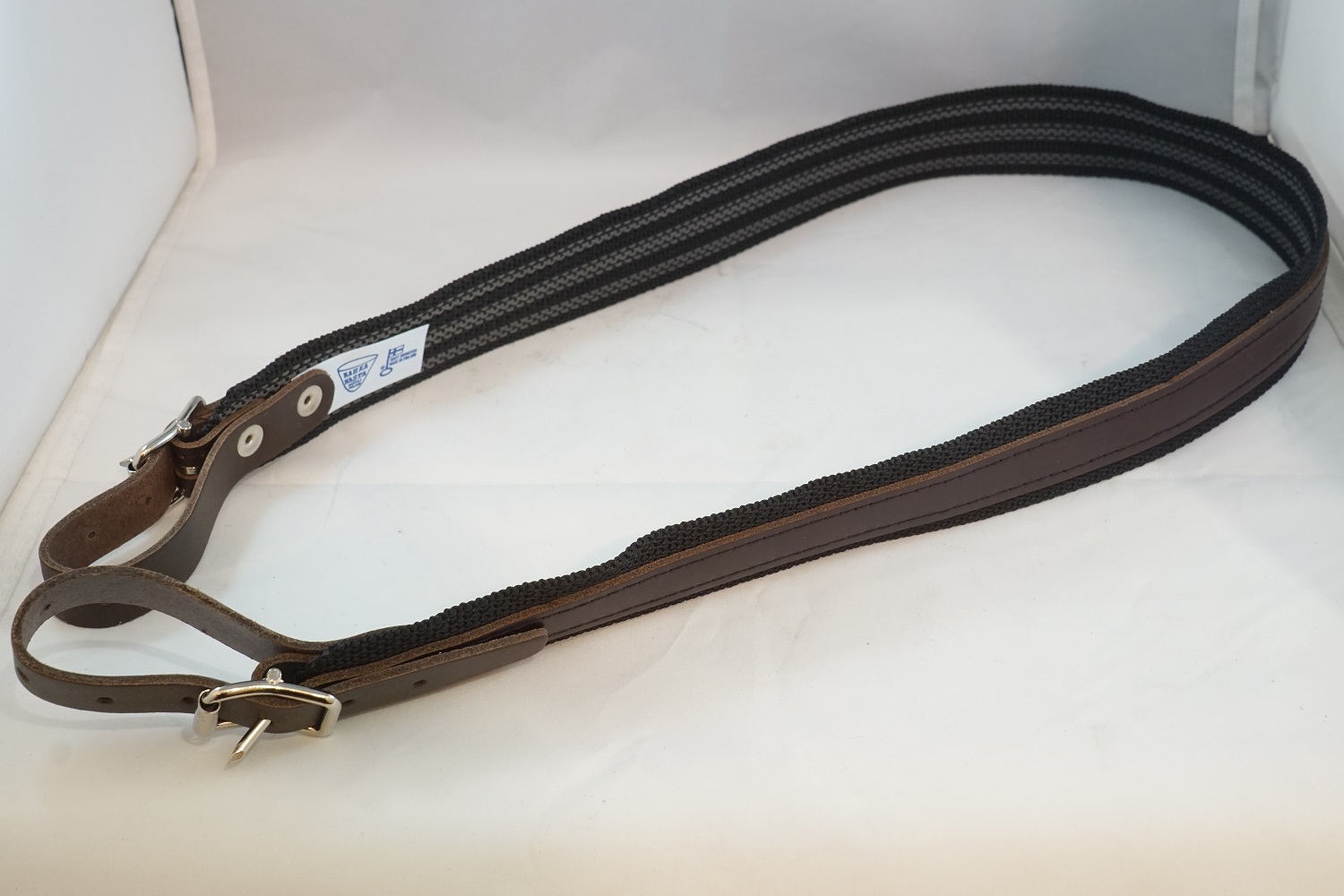 Asehihna nahka ruskea/nylon musta/kumi                                                                            